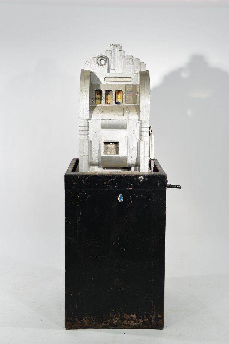 'JACK IN THE BOX' CRUISE SHIP SLOT MACHINE: 'Jack in the Box' label to inside, slot machine rises and drops in box with crank Dimensions: H 60" x W 22" x D 22" Condition: as is, comes with parts, needs restoration