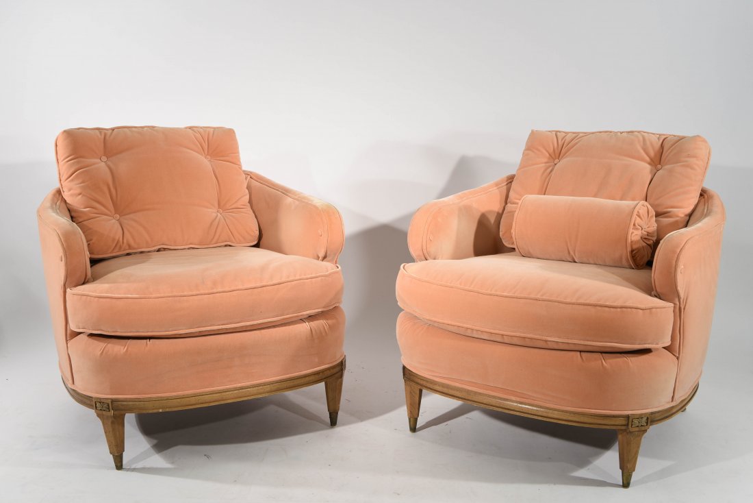 PAIR OF MID CENTURY UPHOLSTERED CHAIRS: Dimensions: H 26" x W 30" x D 35" Condition: Cushions are plush. Normal wear from use, one small tear. One front leg has crack.