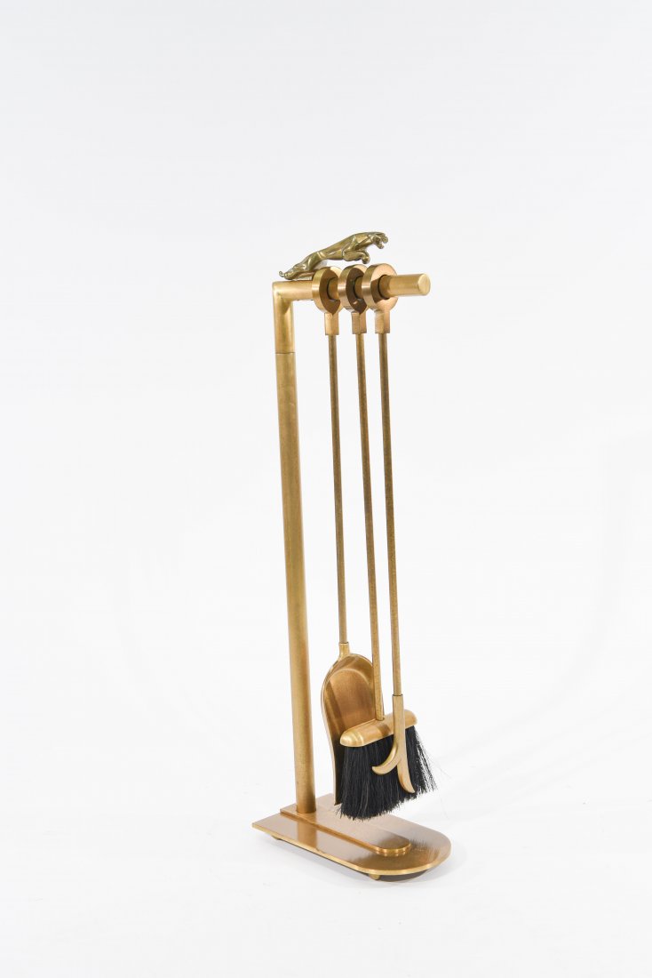JAGUAR BRONZED FIREPLACE TOOL SET: Heavy solid bronzed fireplace tools, unsigned Dimensions: H 33.5" W 6" D 11" Condition: Good. Very slight scratch marks.