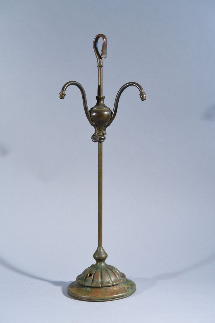 TIFFANY BRONZE LAMP: Stamped on the bottom TIFFANY STUDIOS, NEW YORK 9904. Dimensions: H21 1/4" x W 7 1/4" x D 5 7/8" Condition: good, missing the shades, missing plug and three holes for the wire. Some green patina on th