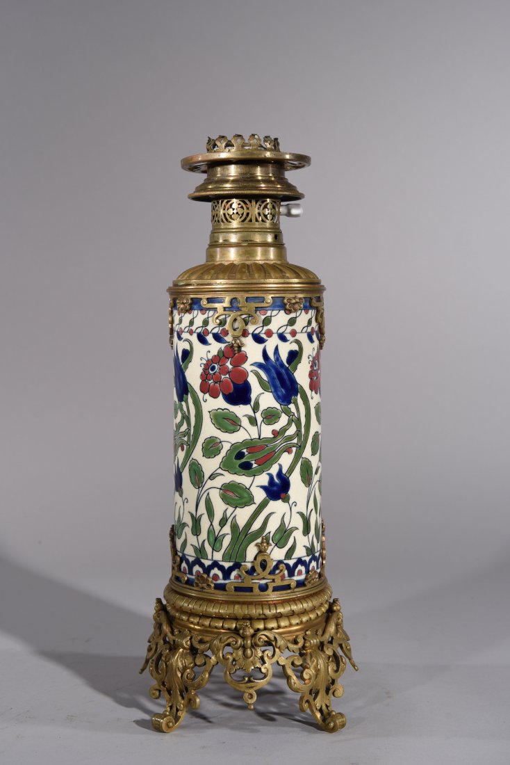 ZSOLNAY PORCELAIN LAMP: Zsolnay enamel pottery and brass base oil lamp. Dimensions: H 16.75" x D 7" Condition: good, surface dirt