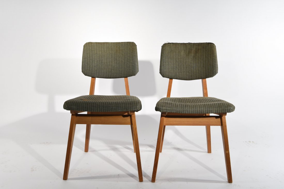 GEORGE NELSON FOR HERMAN MILLER PAIR OF CHAIRS: C. 1952 Dimensions: H 31" x W 18" x D 19" Condition: Some cushion oxidization. Upholstery worn on edges. Some nicks and dings to legs.