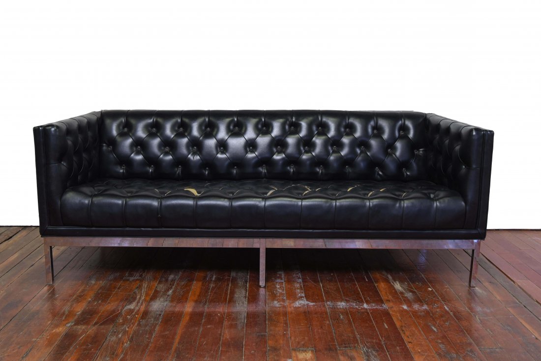 PATRICIAN TUFTED LEATHER SOFA: Dimensions: H 29" x W 78.5" x D 32" Condition: Lots of rips to leather in seat. Scuffs and marks throughout.