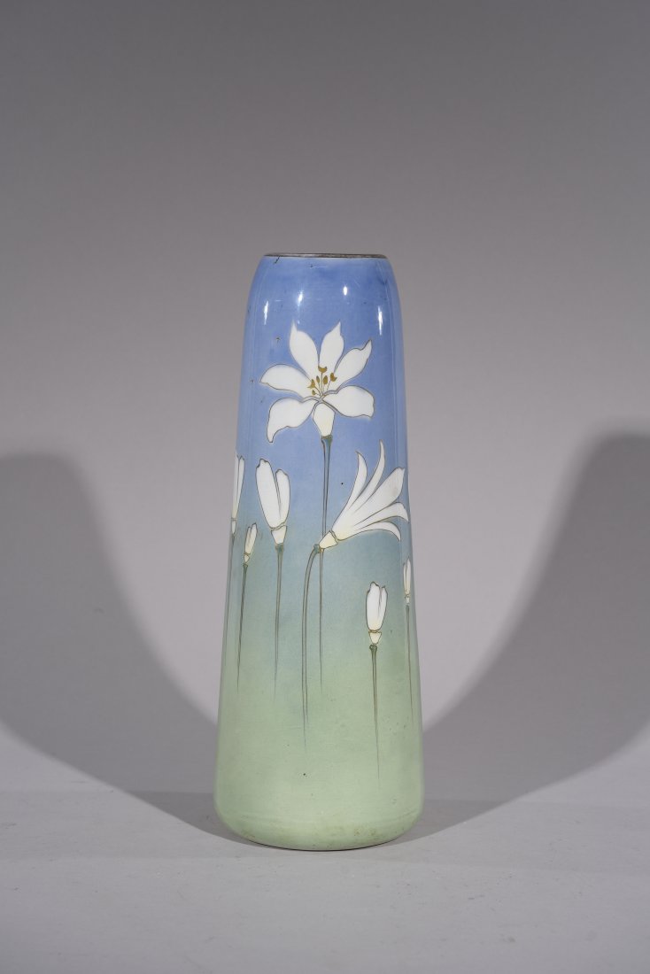 LUNEVILLE FRENCH PORCELAIN VASE: Keller & Guerin Vase Luneville, France Pottery Art Nouveau, design of Lillies, mark to bottom. Dimensions: H14" x W5.5 " Condition: Some crazing. Fading to gilding.