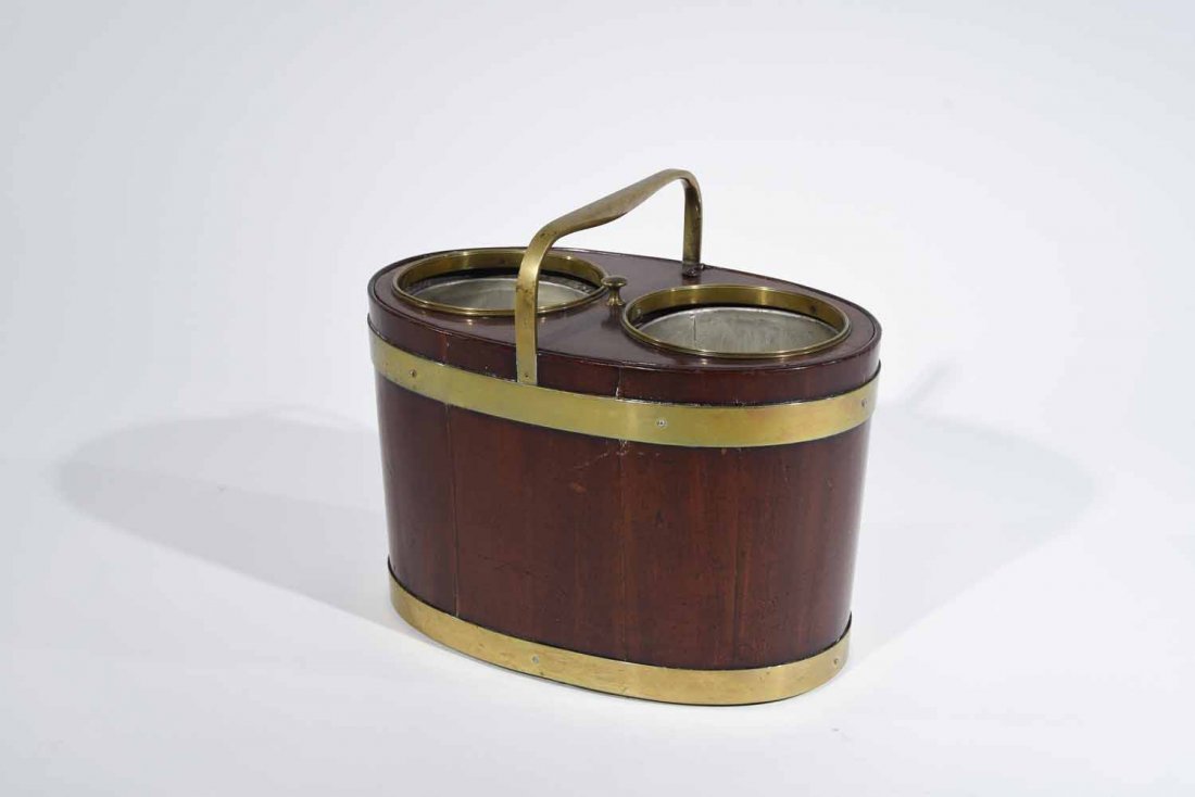WOOD & BRASS WINE COOLER: Label on the side CSA Portable Electric Standard lamp LL 38915.4, The T. Easton Con, Approved Canadian standards Asson. Converted to a Wine Cooler. Oval mahogany and bands and handle in brass with a t