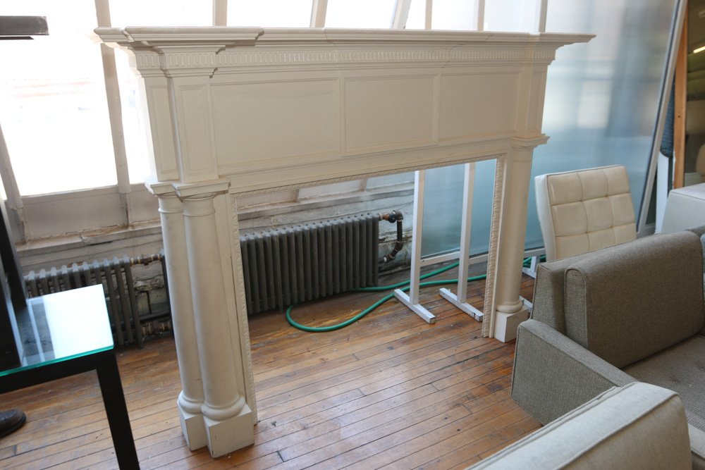 Large decorative white painted mantle used by (1 of 4)