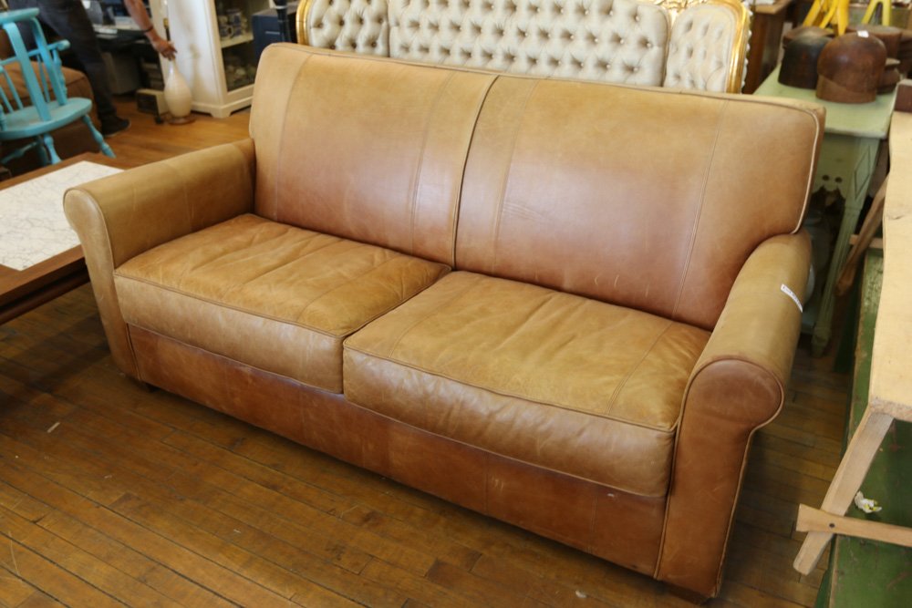 Brown Leather sofa: Brown Leather sofaDimensions: H 35" x 72" x 34"