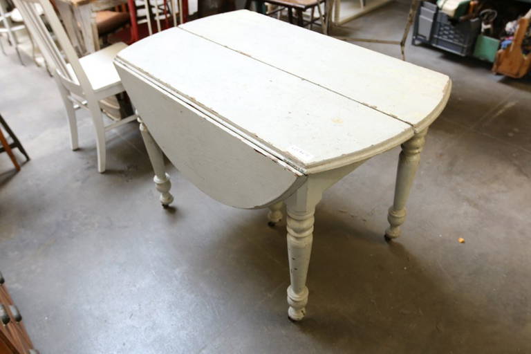 White Round Drop Leaf Wood Table.