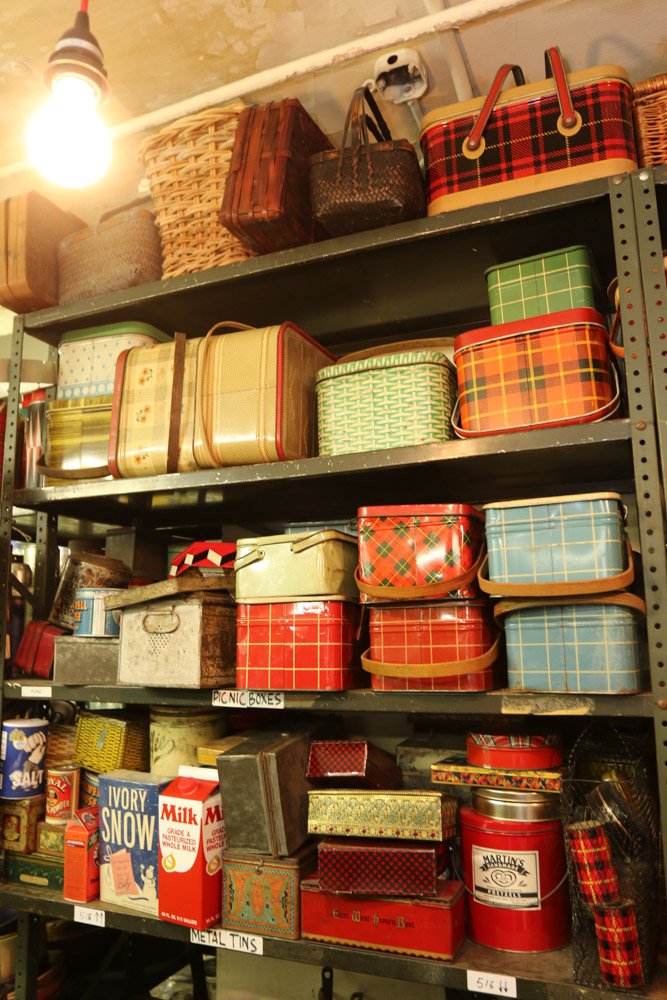 Grouping of tin enamel boxes, picnic baskets. (1 of 9)
