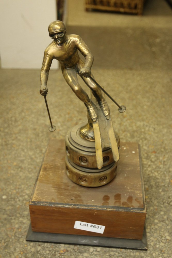 Bronze skier trophy mounted on wood base. (1 of 3)