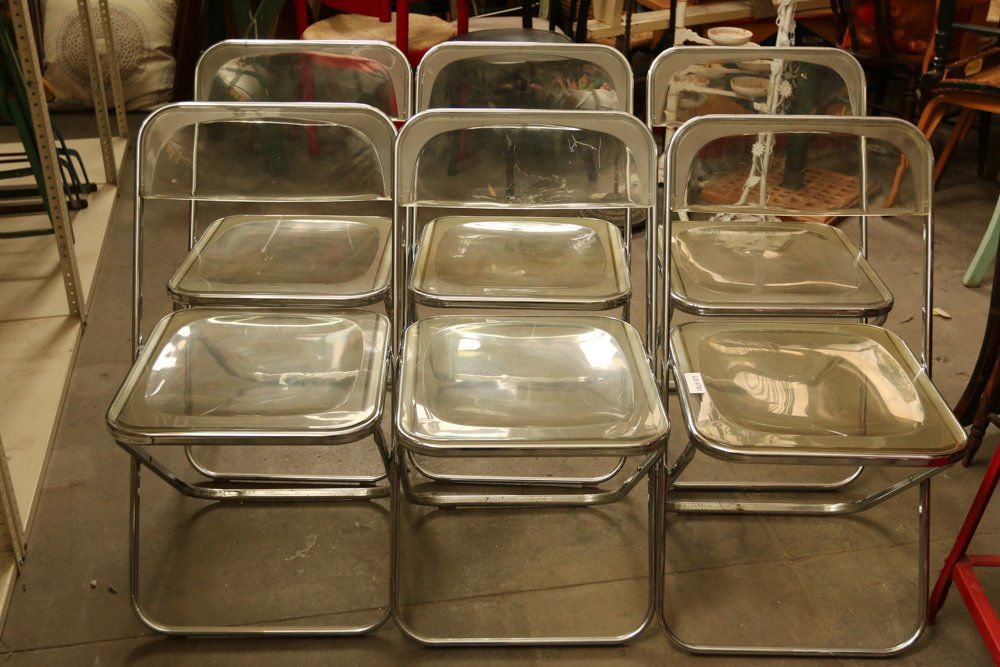 Set of six Plia plastic and metal folding chairs. (1 of 7)