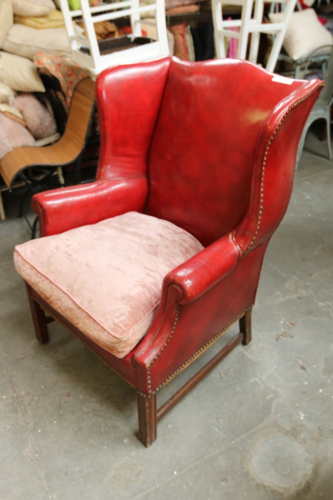 Red leather wing back chair with nail head detail (1 of 9)