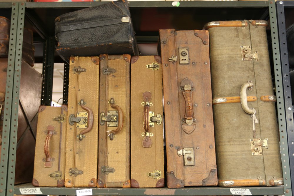 Six vintage fiber and wood suitcases.: Largest Suitcase Dimensions: H 12" x W 30" x D 18"
