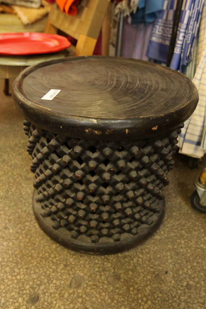 Carved African table. (1 of 6)