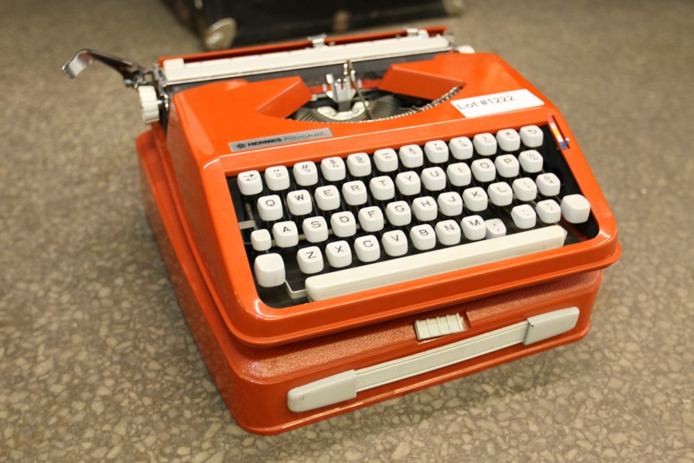 Hermes rocket orange typewriter. (1 of 5)