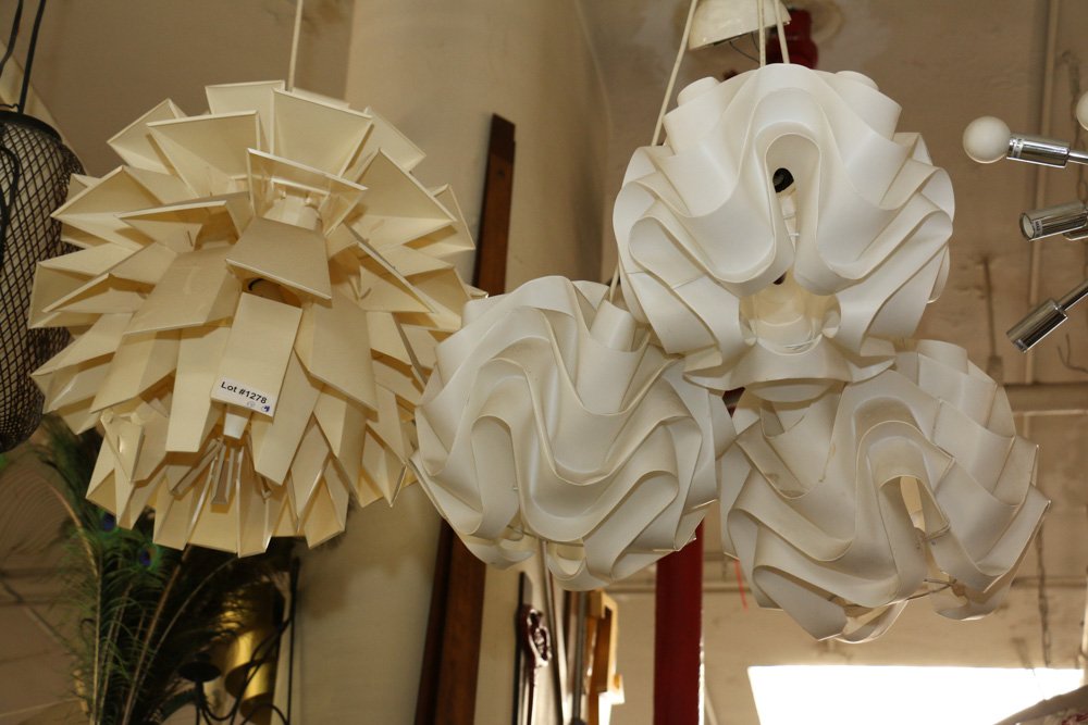 Four white plastic light fixtures, (1 of 3)