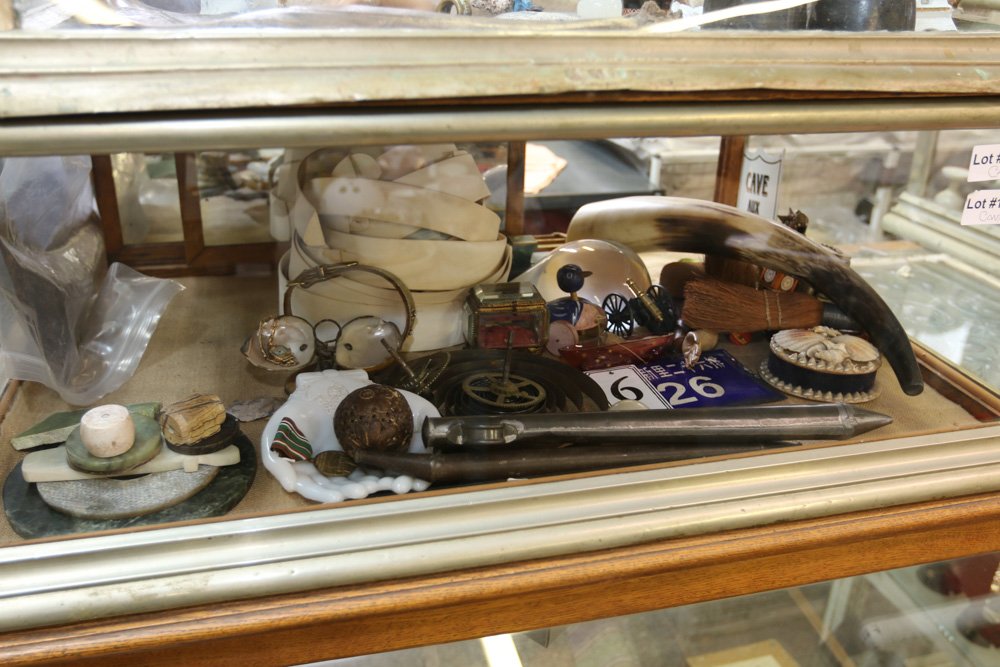 Contents of nickel plated display case objets (1 of 8)