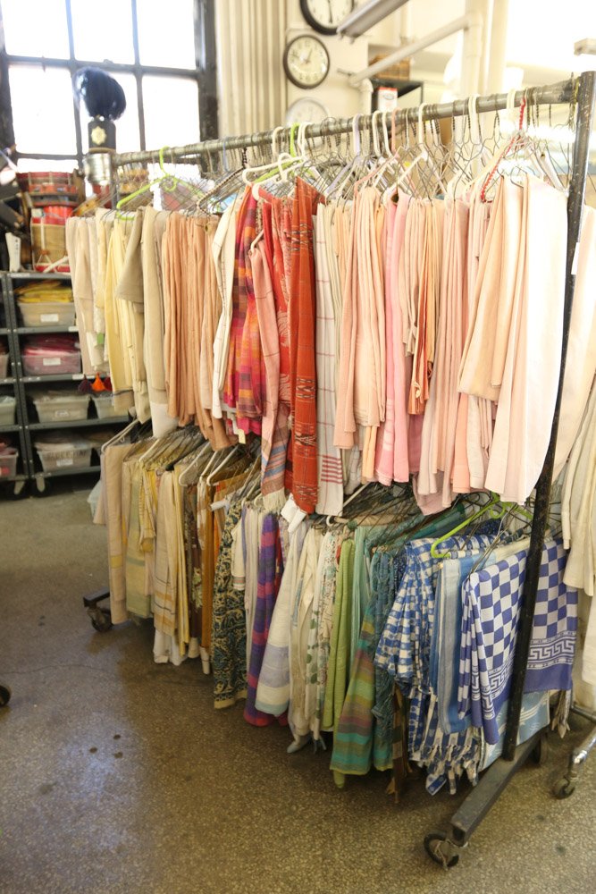 Whole rack of paisley colored table cloths beiges, (1 of 10)