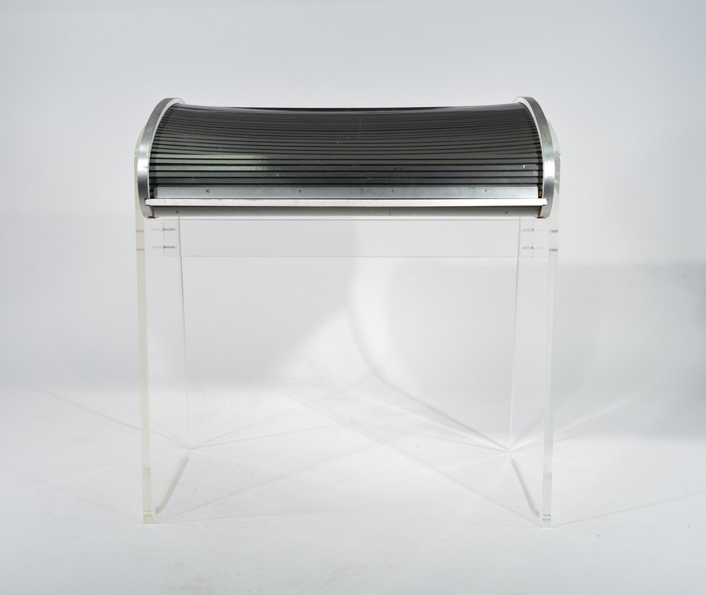 LUCITE WRITING DESK, C.1970s: TAMBOUR ROLL TOP AND PULL OUT WORK SURFACE WITH LUCITE SIDES, UNMARKED. Dimension: H 37" x W 35" x D 22.5" Condition: Scuffs and light dings to all surfaces.
