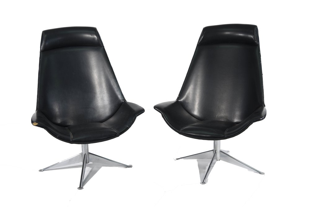 (2) POUL M. JESSEN; VIBY DENMARK LEATHER CHAIRS: Swivel chairs. Original tags to bottom, including Danish quality control tag. Dimensions: H 36" x W 24" x D 19" Condition: Small rips to leather