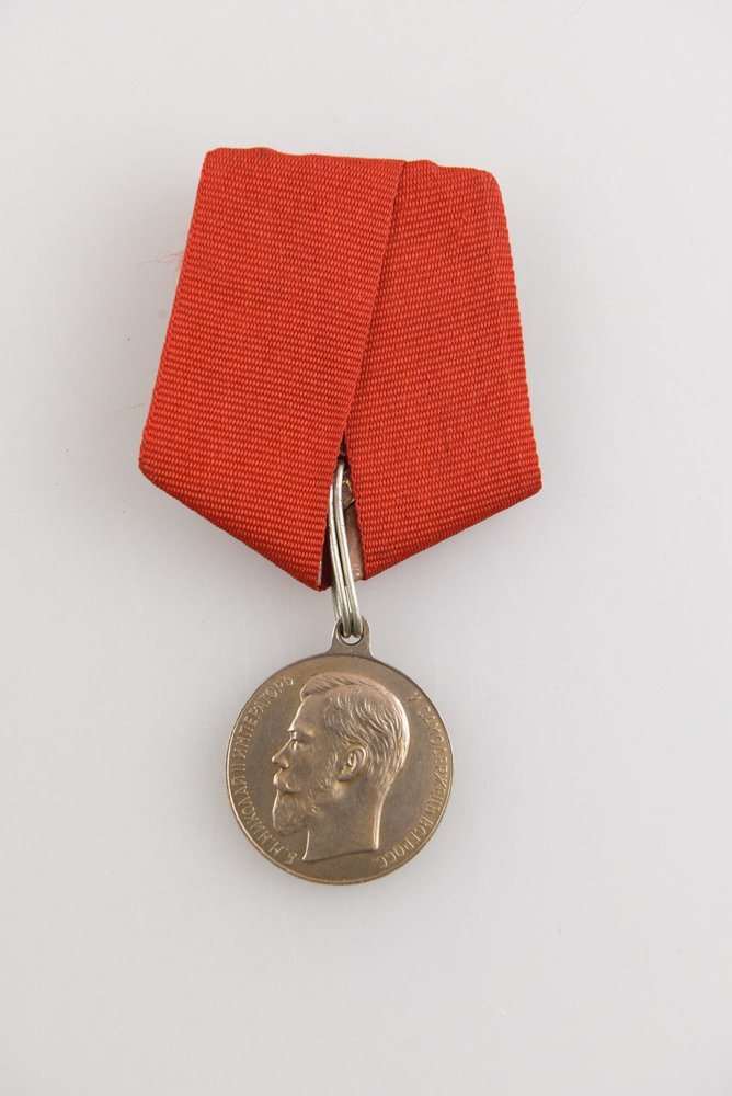 RUSSIAN NICHOLAS II - MEDAL FOR ZEAL: Russia, Nicholas II. Medal for zeal , silver. One ribbon has been replaced. Dimensions: With ribbon H 3.75" x W 2", Medal 1 1/8" diameter Condition: Some normal wear from age.