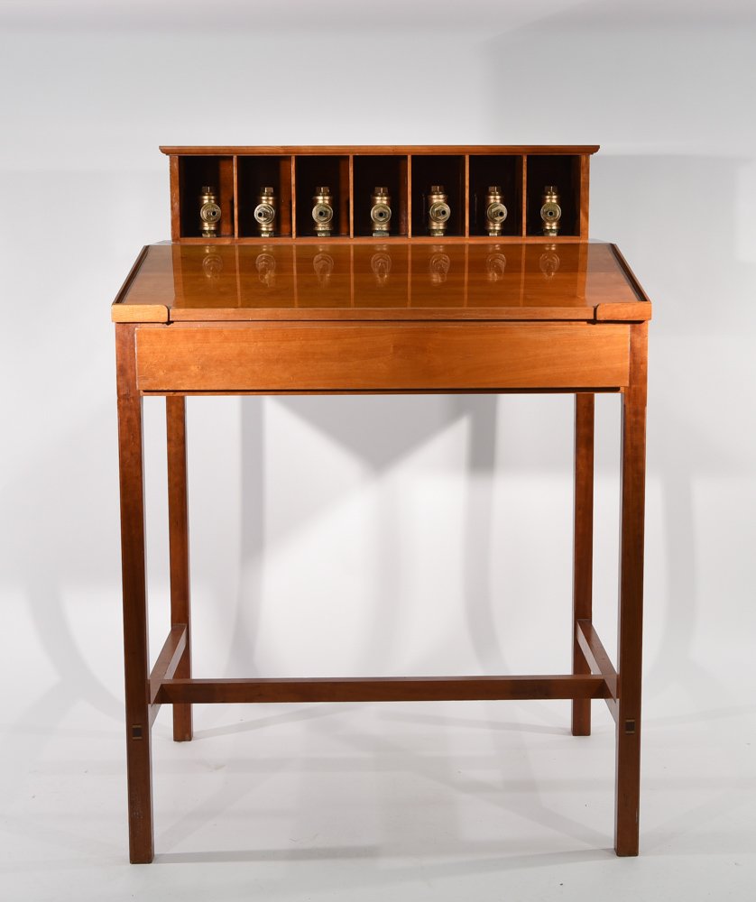 WILLIAM STONE (AMERICAN 1944 -: "FALL LINE", 1989 A converted desk converted into a fountain. Made in cherry wood, brass fittings, pump and water Dimension: H 53.5" x W 38.25" x W 32.5" Condition Good. Note: Gallery Label TOM CUGLIA