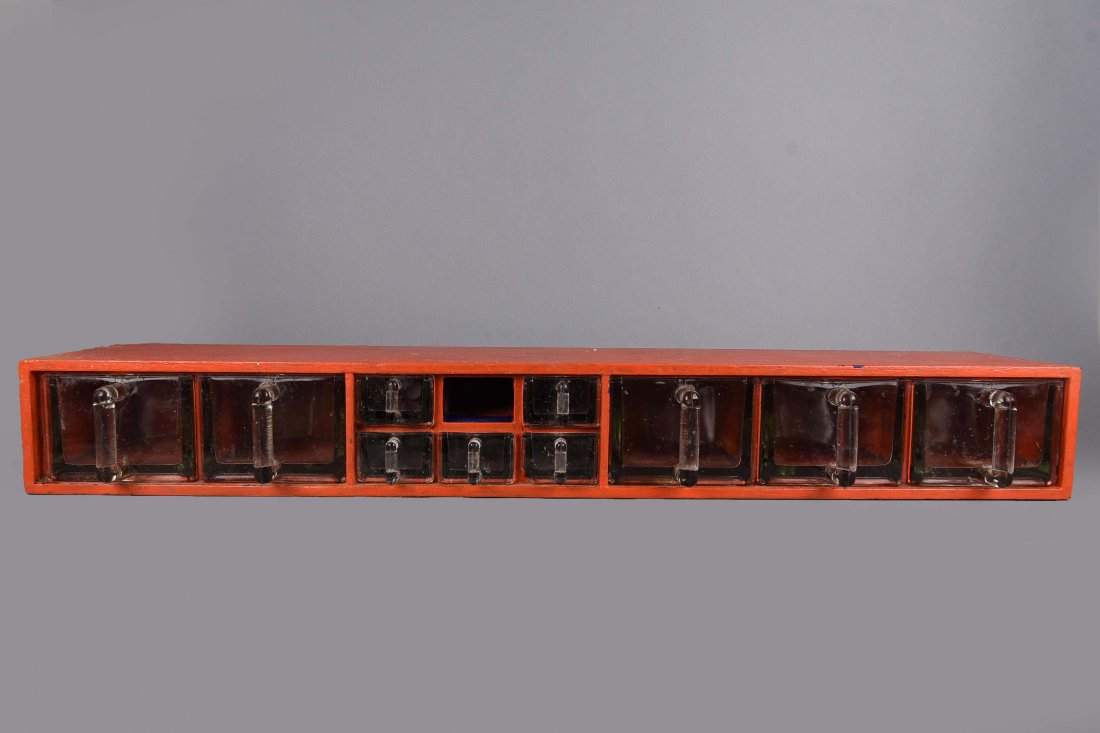 IDEAL GLASS AND WOOD SPICE CABINET: Dimensions: H 5.25" x W 39" x D 7.5" Condition: Missing one small drawer. Some loss of paint.