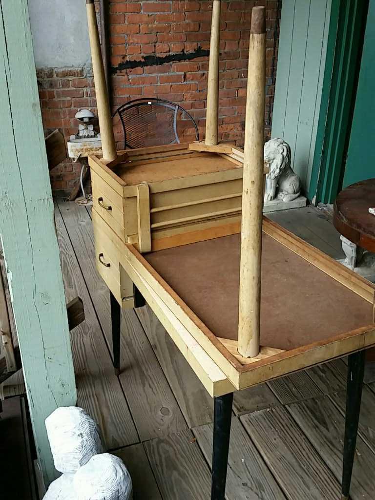 PAIR OF MID-CENTURY DESKS: Dimensions: H 28.5" x W 40" x D 20" Condition: Lifting to top of both. Dirt, scratches, and marks throughout both. One missing brass cap on foot.