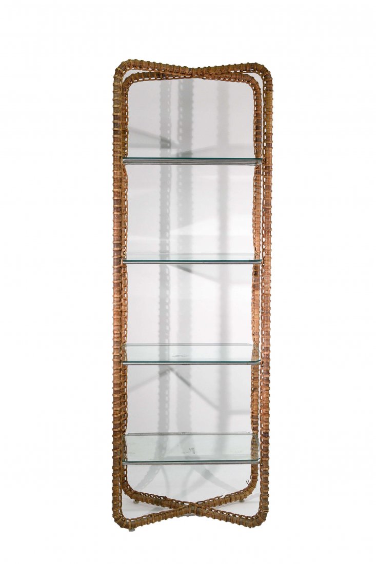 RATTAN & ALUMINUM ETAGERE: Dimensions: H 84" x W 28" x D 16" Condition: Some finish wear and very light pitting to chrome. A few breaks to wooden weave wrap. Some small chips to the edges of shelve glass.