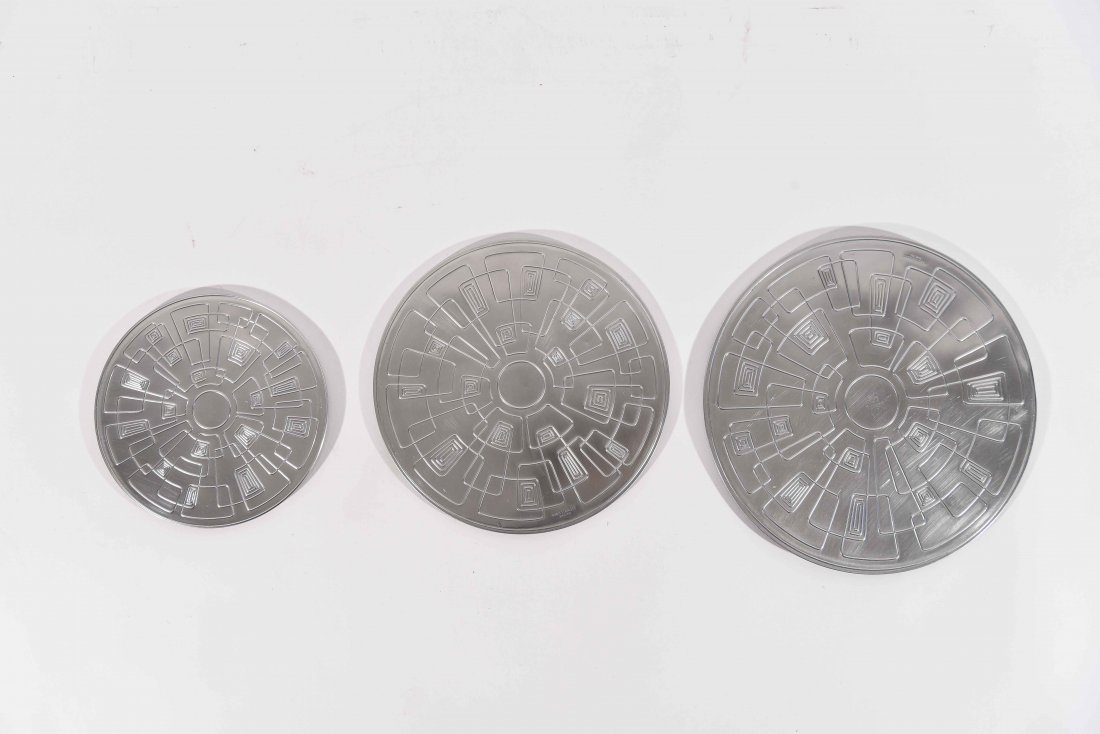 THREE PIECE SET OF GABIS GENSE STAINLESS STEEL: SCANDINAVIAN MID-CENTURY MODERN TRIVETS Dimensions: Dia 8.75" Conditions: Scratches throughout