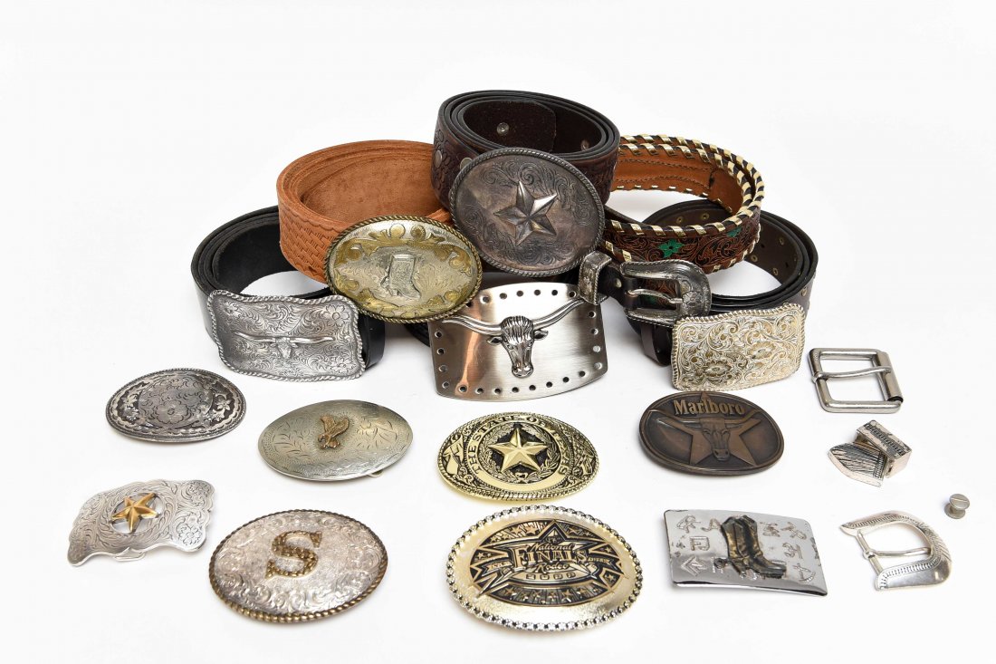 GROUPING OF WESTERN BELTS AND BUCKLES: Including Spanish, Mexican (Alpaca), Crumrine (Nevada), Western Flair (Colorado Springs), Professional Rodeo Cowboys Association (Columbus, Montana), Marlboro (Philip Morris) and Chambers Belt Co. Dim