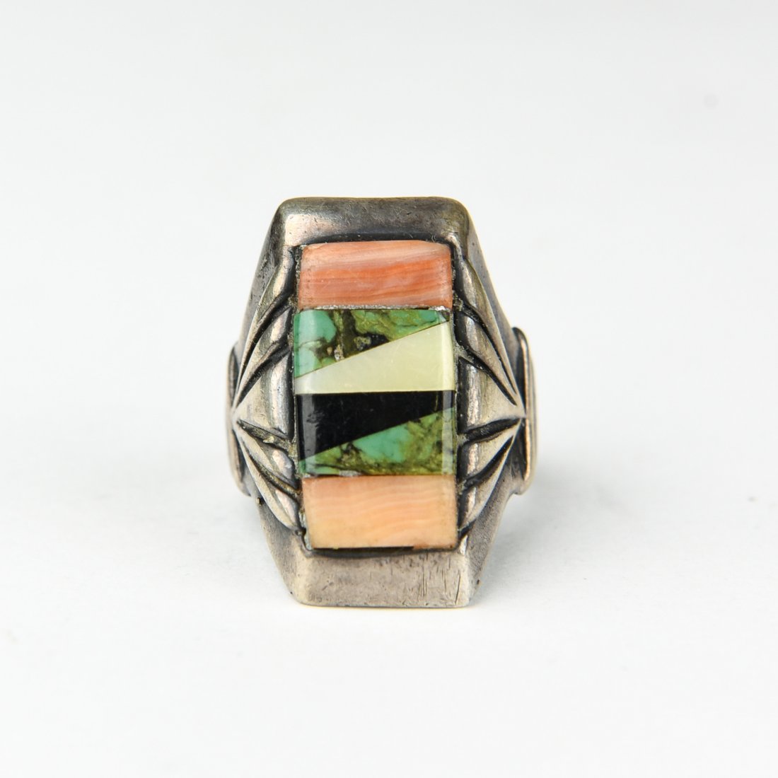STERLING AND INLAID STONE RING: Inlaid turquoise, onyx, spiny oyster, mop. Not hallmarked. Ring Size: 9 Weight: 0. 38 ozt Condition: Wear consistent with age and use