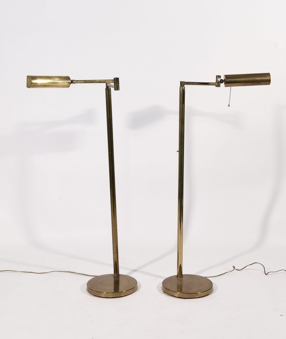 PAIR OF KOCH AND LOWY ARTICULATED BRASS FLOOR: LAMPS Dimensions: when not extended: H 42.5" x DIA 18.5" Condition: Some moderate finish wear. Signs of early pitting. Not tested. Cords appear to be original.
