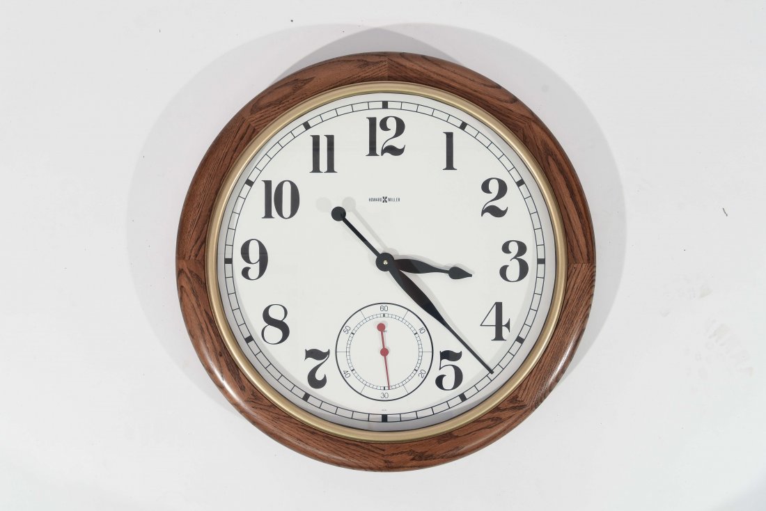 HOWARD MILLER WALL CLOCK: Dimensions: Dia 25" x D 3.5"; Condition: scratches to brass