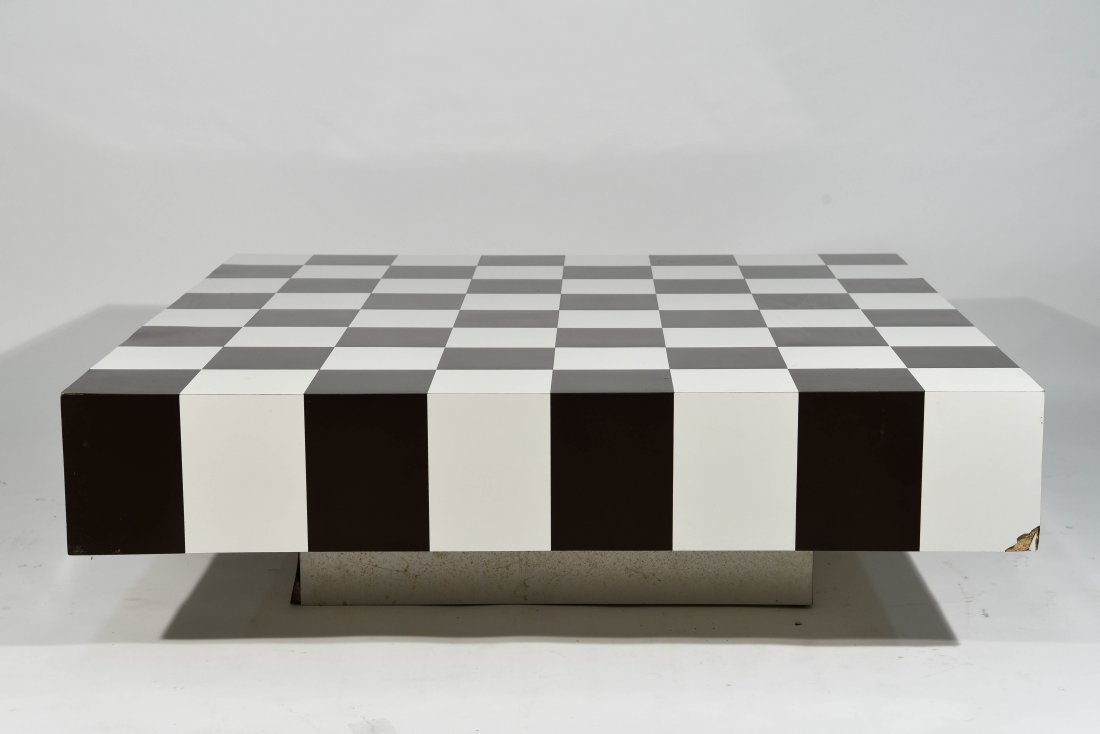 CHECKERBOARD PATTERN COFFEE TABLE: Similar to that which Kourtney Kardashian's designer Jeff Andrews used to furnish her home. Dimensions: H 14" x W 47.75" x D 48.25" Condition: chips and splitting to veneer swelling some water damage.