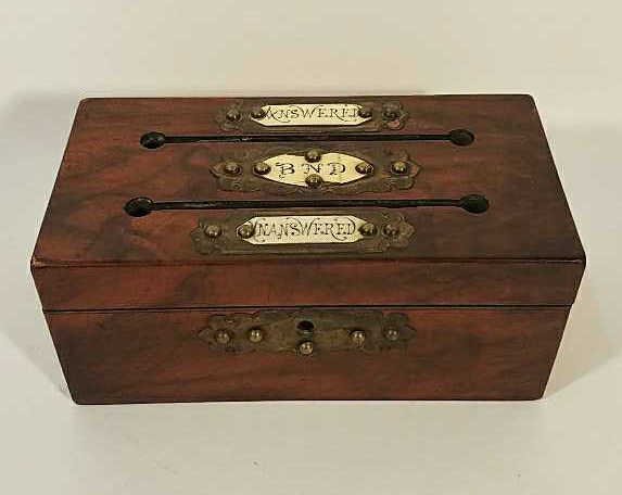 ANTIQUE LETTER BOX: Dimensions: H 4" x W 9" x D 4.5" Condition: Some damage to two top corners, dents to wood, paper inside has rips