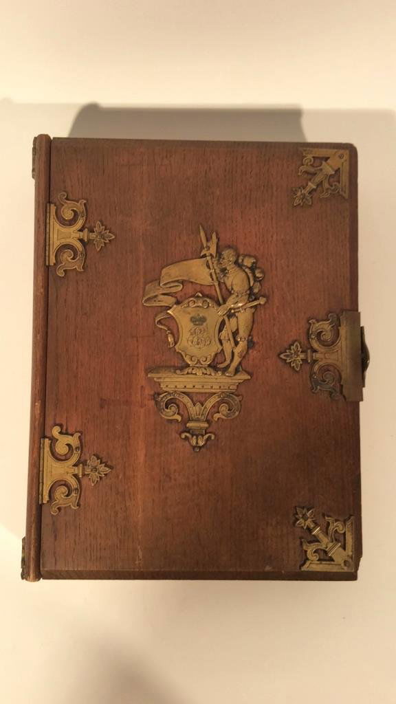 C. 1900 ORMOLU & WOOD BOOK BOX: Dimensions: H 14" x W 11" x D 3.25" Condtion: Damage to corners and edges, top pieces split and has been glued, bottom piece split and has been nailed.