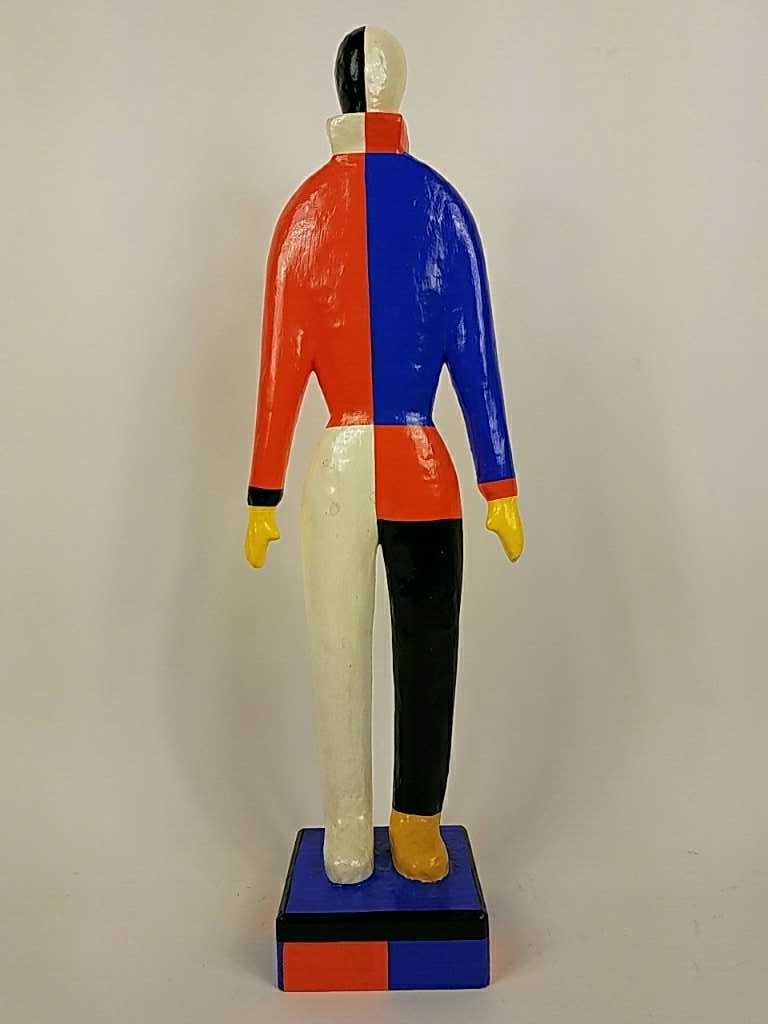 GUGGENHEIM MUSEUM SCULPTURE: Dimensions: H 20" Condition: Small scuff to head, small chip to paint on one hand