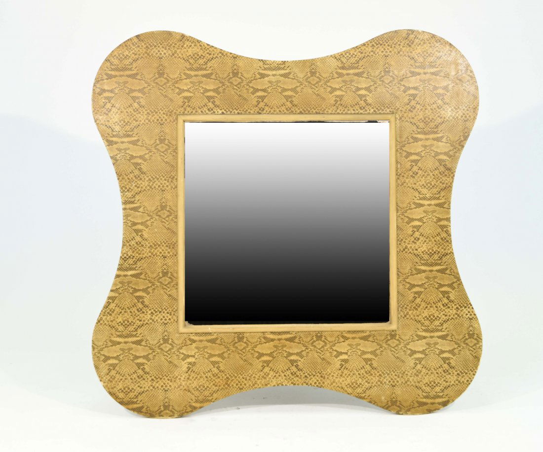 GIANT FAUX PYTHON FRAME MIRROR: In the manner of Karl Springer Dimensions: H 44" x W 44" x D 0.75" Condition: Few scratches and wear to edges. Some scratches and dings to trim around mirror. Some scuffs and 4" x 4" area of de-silver
