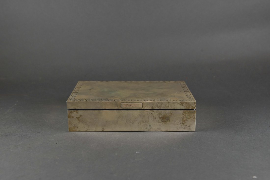 VERSACE STERLING BOX WITH GREEK KEY MOTIF 1980'S: Dimensions: H 1.75" x W 7.5" x D 5" Condition: Some tarnishing and light scratches. White paint marks to interior.