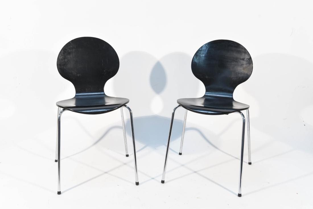 PAIR OF BENTWOOD CHAIRS MANNER OF FRITZ HANSEN: Dimensions: H 32.5" x W 17" x D 20" Condition: Some pitting to legs, 1" veneer chip and small dent to one seat, some nicks and small chips throughout edges and scuffs throughout