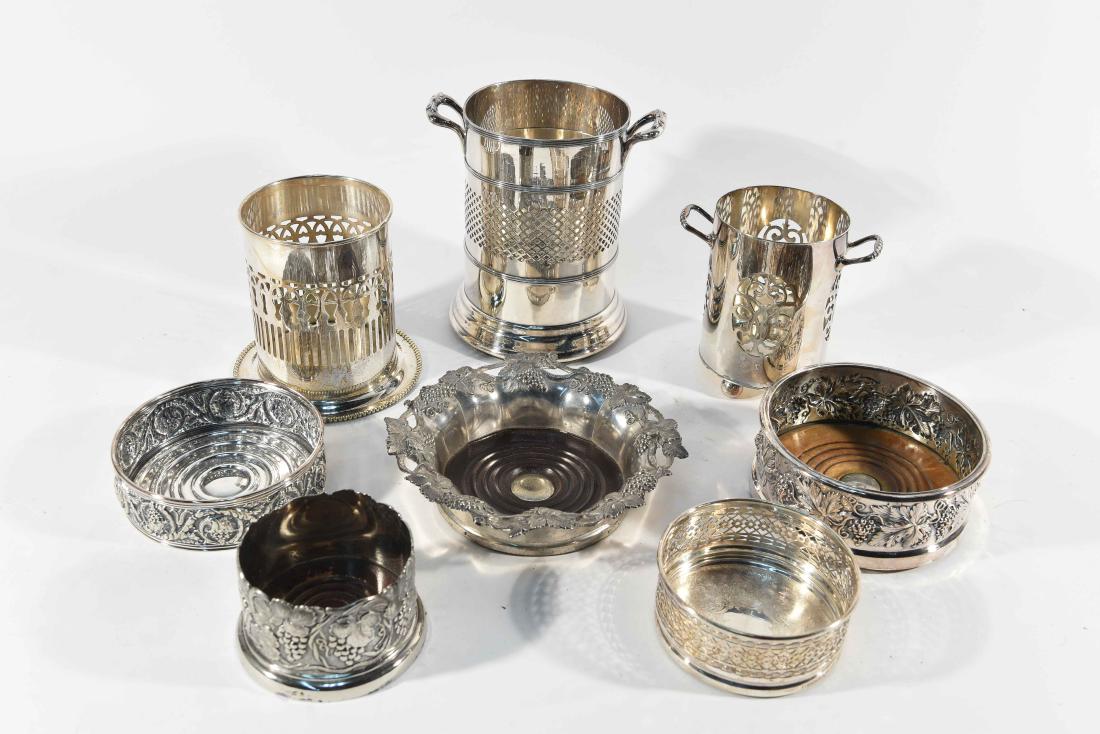 GROUPING OF SILVER-PLATE WINE COASTERS: Dimensions: H 7" x W 6.5" x D 5.25" Condition: Some light scratches and some finish loss throughout.