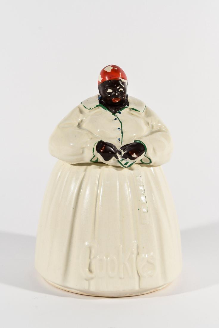 MCCOY MAMMY COOKIE JAR: Dimensions: H 11" x W 7" Condition: Paint loss.