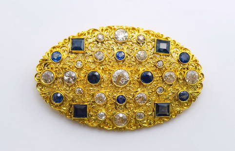 M. Buccellati 18k YG Diamond and Sapphire Brooch.: Brand: Mario Buccellati. Material: 18K Yellow Gold. Stone: Approx. 4.5 CT Diamond, and Sapphire. Weight: 13.9 Gram. Measurements: 2 Inch Length and 1.5 Inch Width.