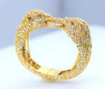 Spectacular 18K YG Diamond and Ruby Eyed Bangle.