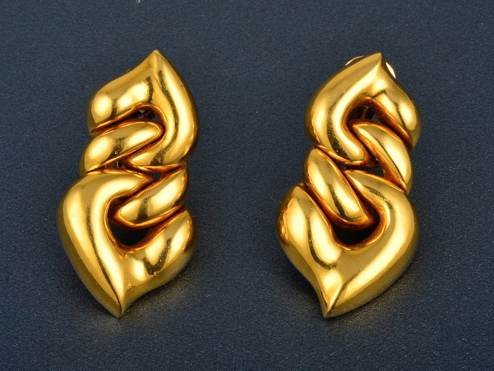 Bvlgari gold ear clips: Bvlgari gold ear clips 18K yellow gold heart shape link style clips Dimension: 7/8" x 1 1/2" Signed: Bvlgari 750 1970 AL Gross weight: 18.9 dwt