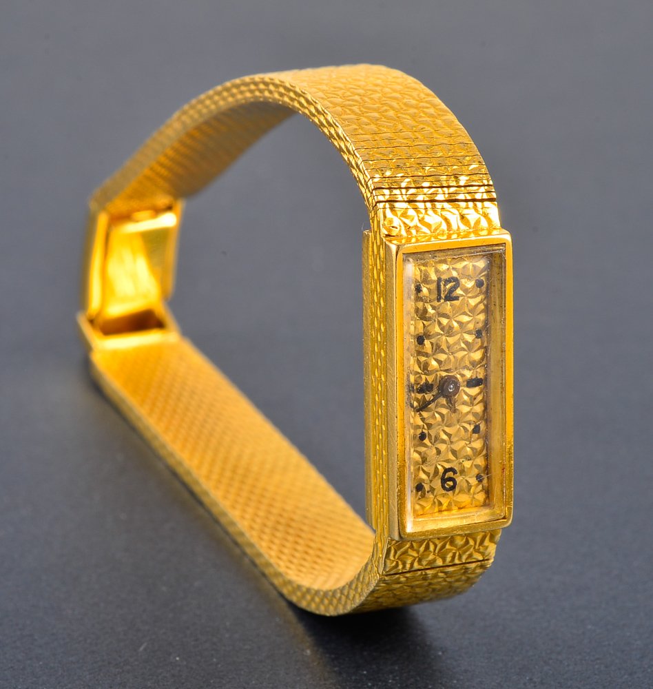 Van Cleef and Arpels lady's yellow gold wristwatch: Van Cleef and Arpels lady's 18k yellow gold wrist watch Signed: stamped made in France Dimension: 1/4"w x 3/4"h, Gross weight: 25.1 dwt