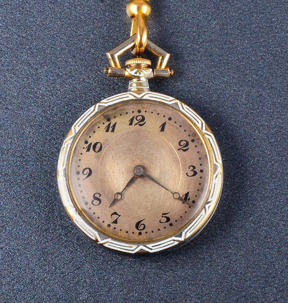 Longines Antique blue enamel pendant watch: A Longines 14K Antique blue enamel pendant watch with matching watch chain Dimensions 1" diameter, chain 24" L Gross weight: 12.6 dwt Note: watch currently not running; clasp marked 9k