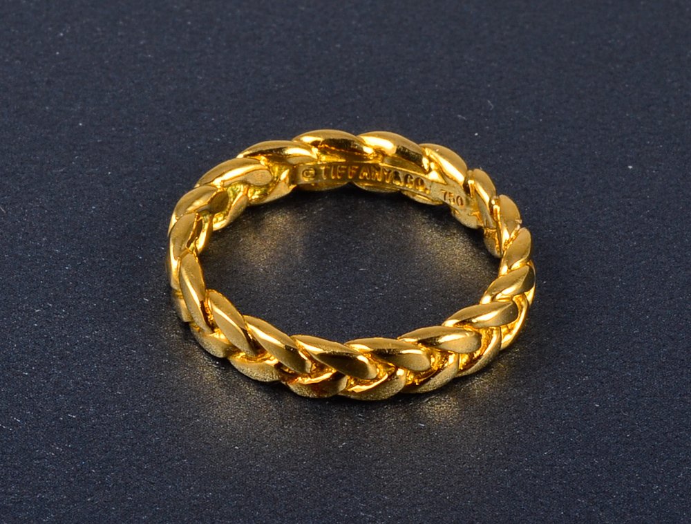 Tiffany & Co. braided gold band: Tiffany & Co. braided 18K gold band Gross weight: 3.7 dwt Ring size: 8.5