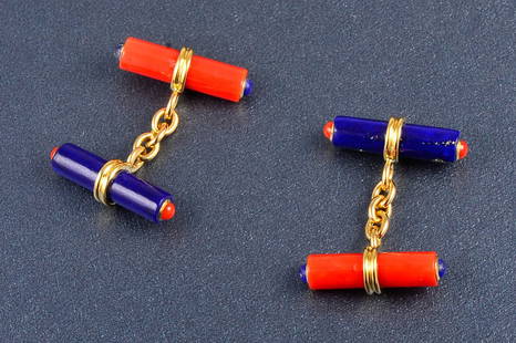 Trianon Lapis and coral cuff-links: 18K yellow gold tubular bar shape Lapis and Coral cuffs with accents of cab Lapis and Coral at the tip of the bar. Signed: 750 and Trianon gold mark Dimension: 3/4" long on the cuff